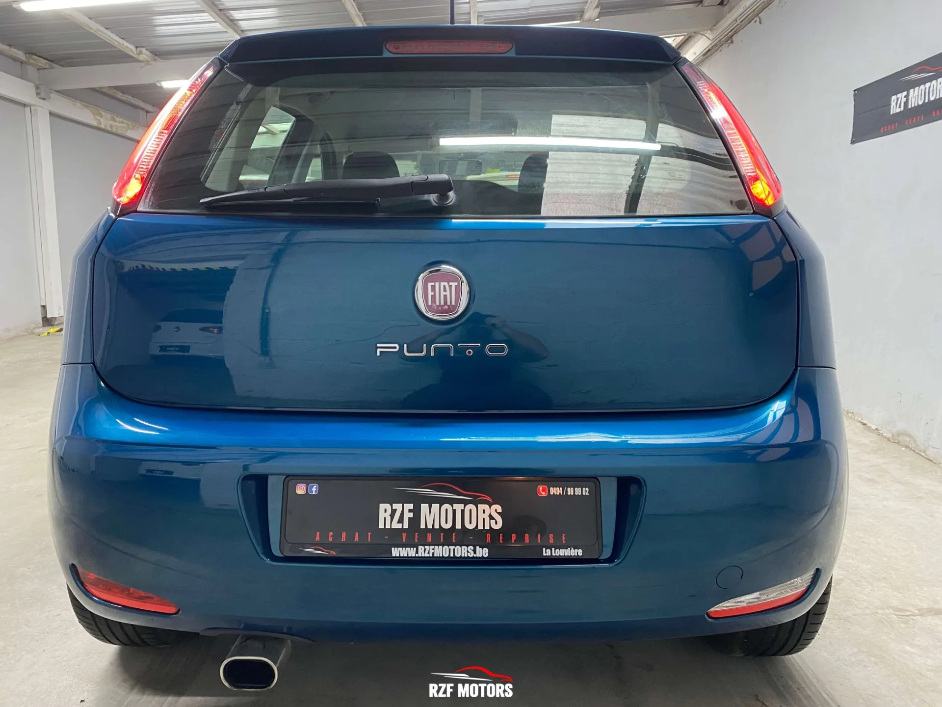 Vue 5 — Véhicule d’occasion Fiat Punto Sport 2012