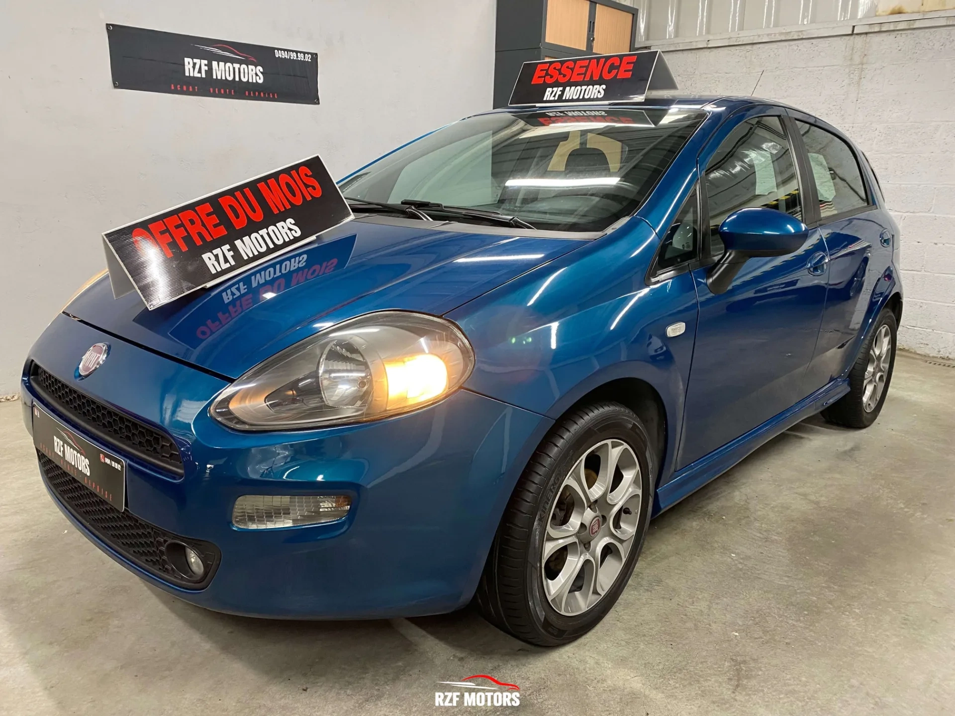 Vue 7 — Véhicule d’occasion Fiat Punto Sport 2012